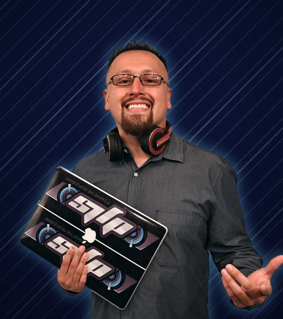 DJ LS (Juan Zafra) holding his DJ LS laptop on a navy and chrome background