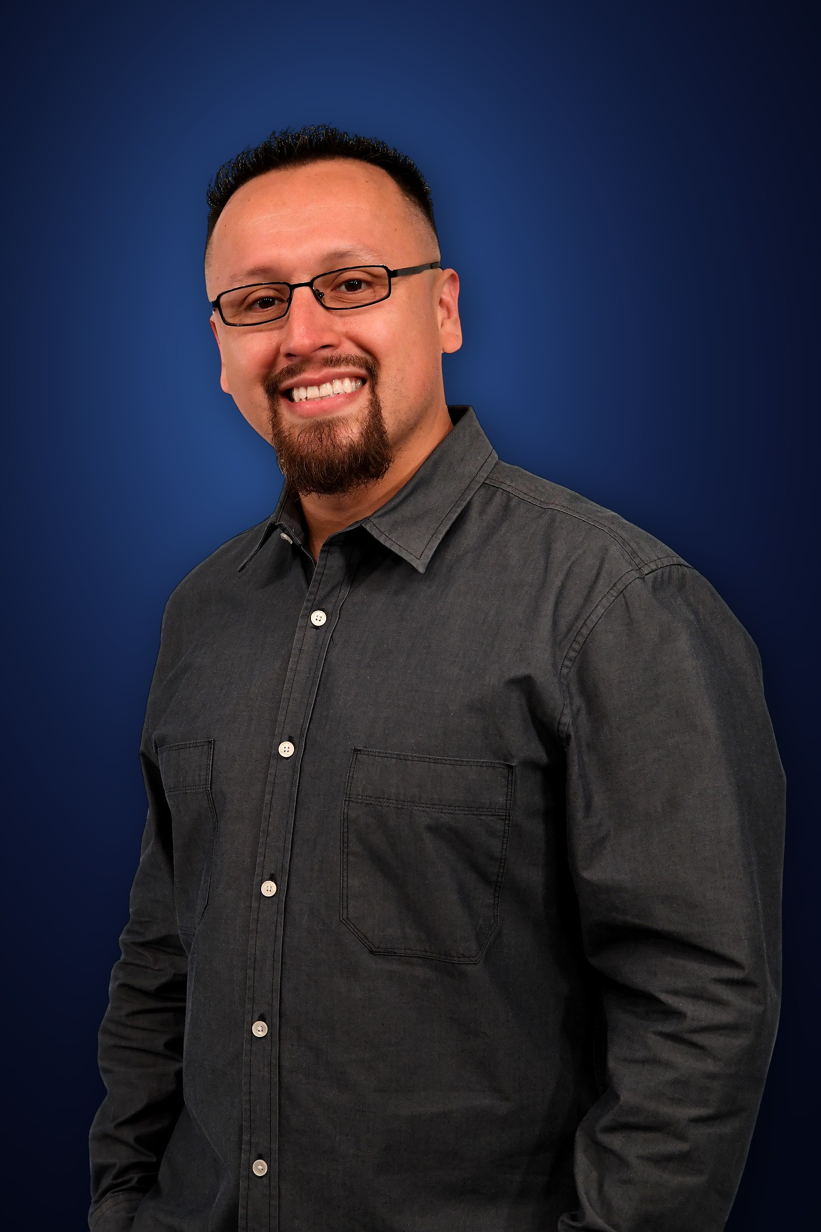 DJ LS (Juan Zafra) smiling, portrait.